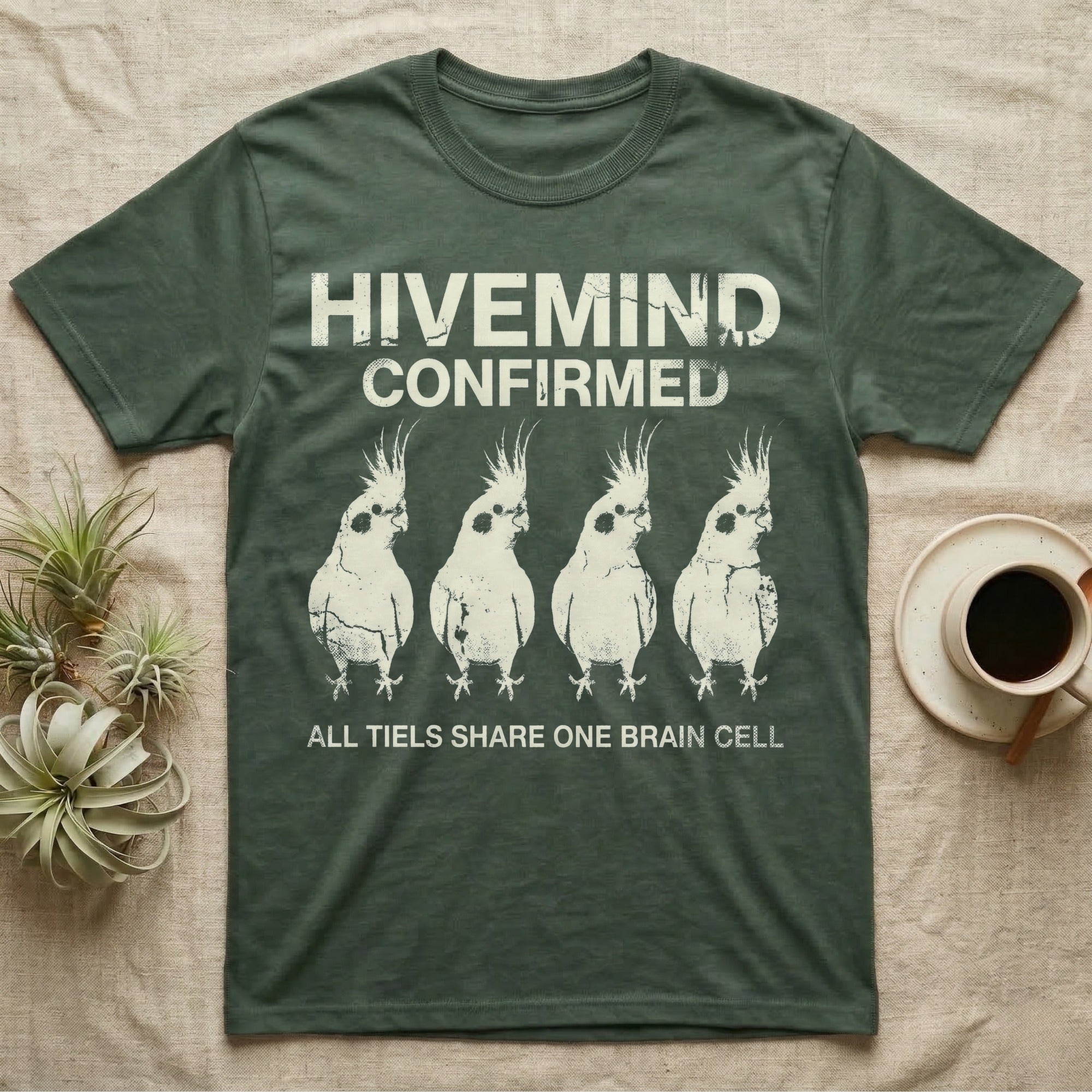 Cockatiel Hivemind Confirmed T-Shirt in Military Green — Grunge-distressed four cockatiels in identical synchronised posture with distressed type "Hivemind Confirmed."