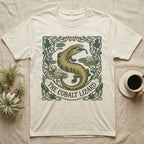 T-shirt with "The Cobalt Lizard" text and a gold and green lizard design.