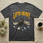 Rhino Beetle Feral T-Shirt in Dark Heather — Horned rhinoceros beetle standing head-on below a dripping amber-gold metal "Lifts Heavy" wordmark