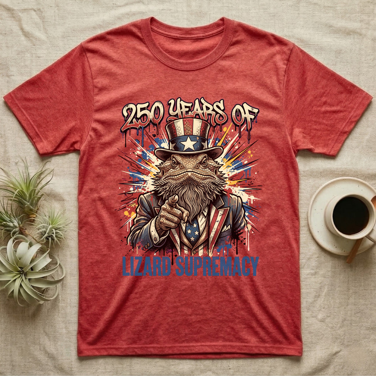 Bearded Dragon Uncle Sam T-Shirt in Heather Red — Splatter-art bearded dragon as Uncle Sam pointing forward under text 250 Years of Lizard Supremacy.