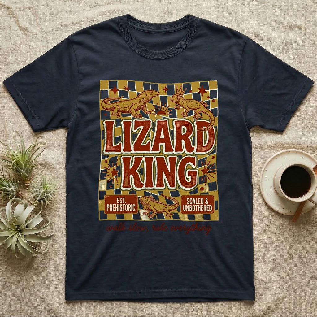 Navy t-shirt with "Lizard King Est. Prehistoric Scaled & Unbothered" text and lizards.