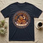 Ball Python Boa-Constricted Candy T-Shirt in Navy — Distressed badge of a witch-hatted ball python on three jack-o'-lanterns, "Boa-Constricted by the Candy."