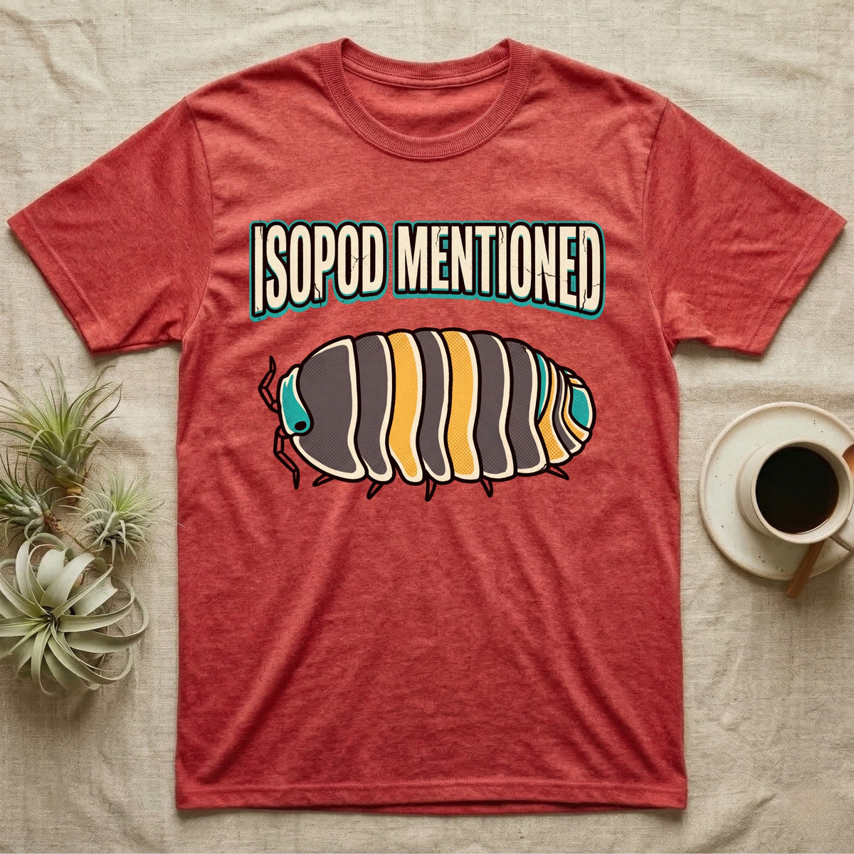 Isopod Mentioned T-Shirt in Heather Red — Bold-vector illustration of a rubber-ducky Cubaris isopod hero under big block caps reading Isopod Mentioned.