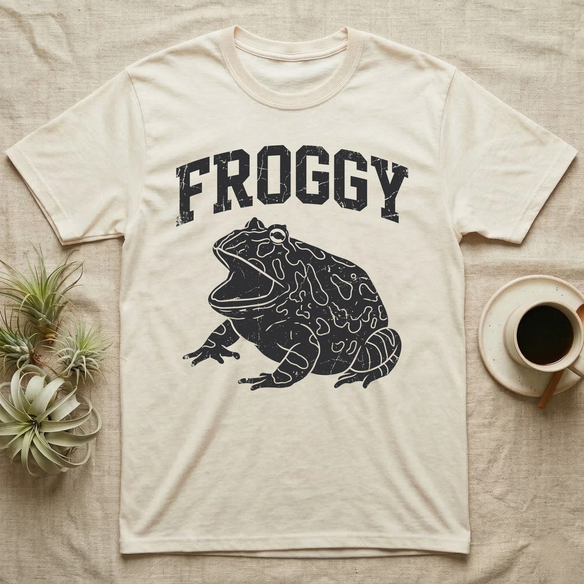 Pacman Frog Froggy T-Shirt in Natural — Worn one-ink print of a round pacman frog puffed up with its mouth gaped wide, under the arched word FROGGY