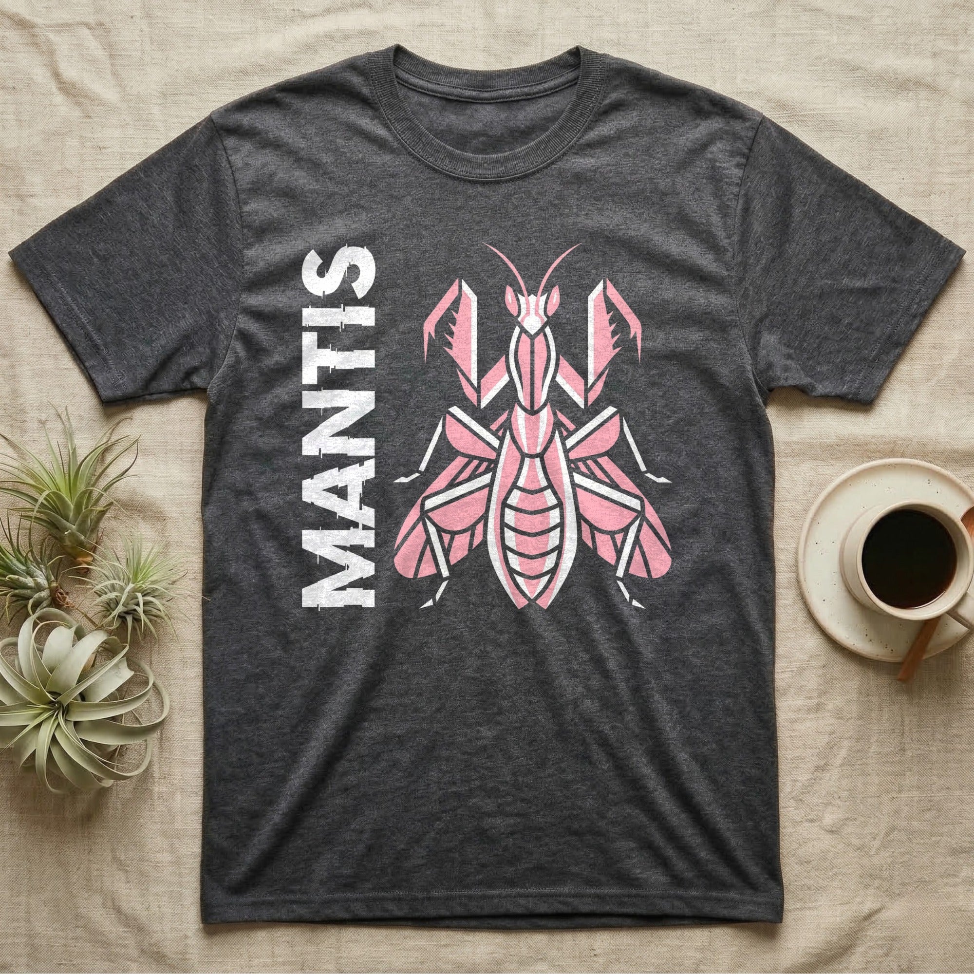 Dark gray t-shirt with a pink geometric mantis and the word "MANTIS".