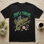 Jackson's Chameleon Feral T-Shirt in Black — Three-horned Jackson's chameleon on a branch below a dripping jade-green metal "Triple Threat" wordmark