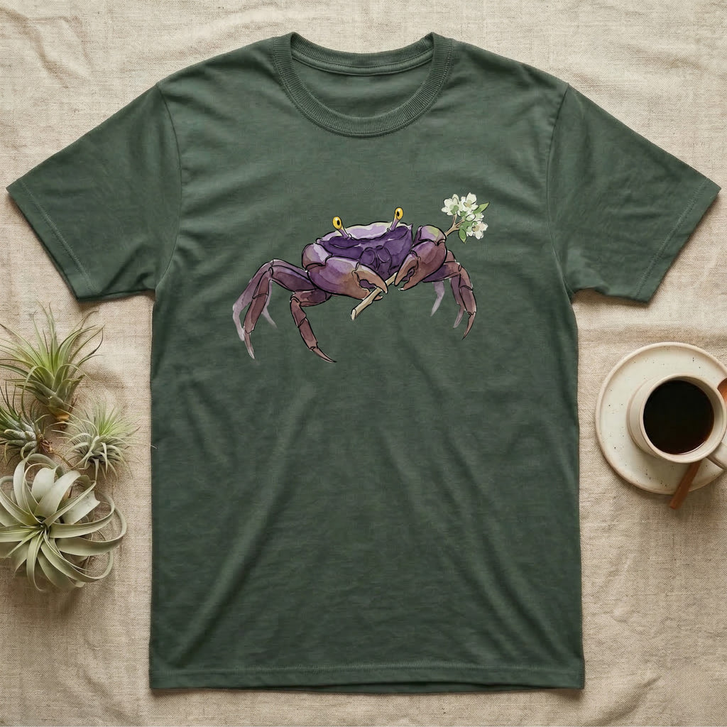 Vampire Crab Blossom T-Shirt in Military Green — Watercolor illustration of a violet-purple vampire crab with yellow eye stalks holding a moss-flower blossom sprig, on a dark grey t-shirt.