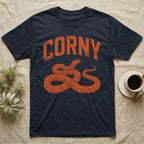 Corn Snake Corny T-Shirt in Navy — Worn orange one-ink print of a corn snake lying in loose coils, head raised, under the arched word Corny
