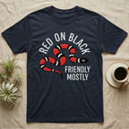 Milk Snake Friendly T-Shirt in Navy — Worn screen-print of a red, black and cream banded milk snake under the cream words Red On Black, Friendly, Mostly
