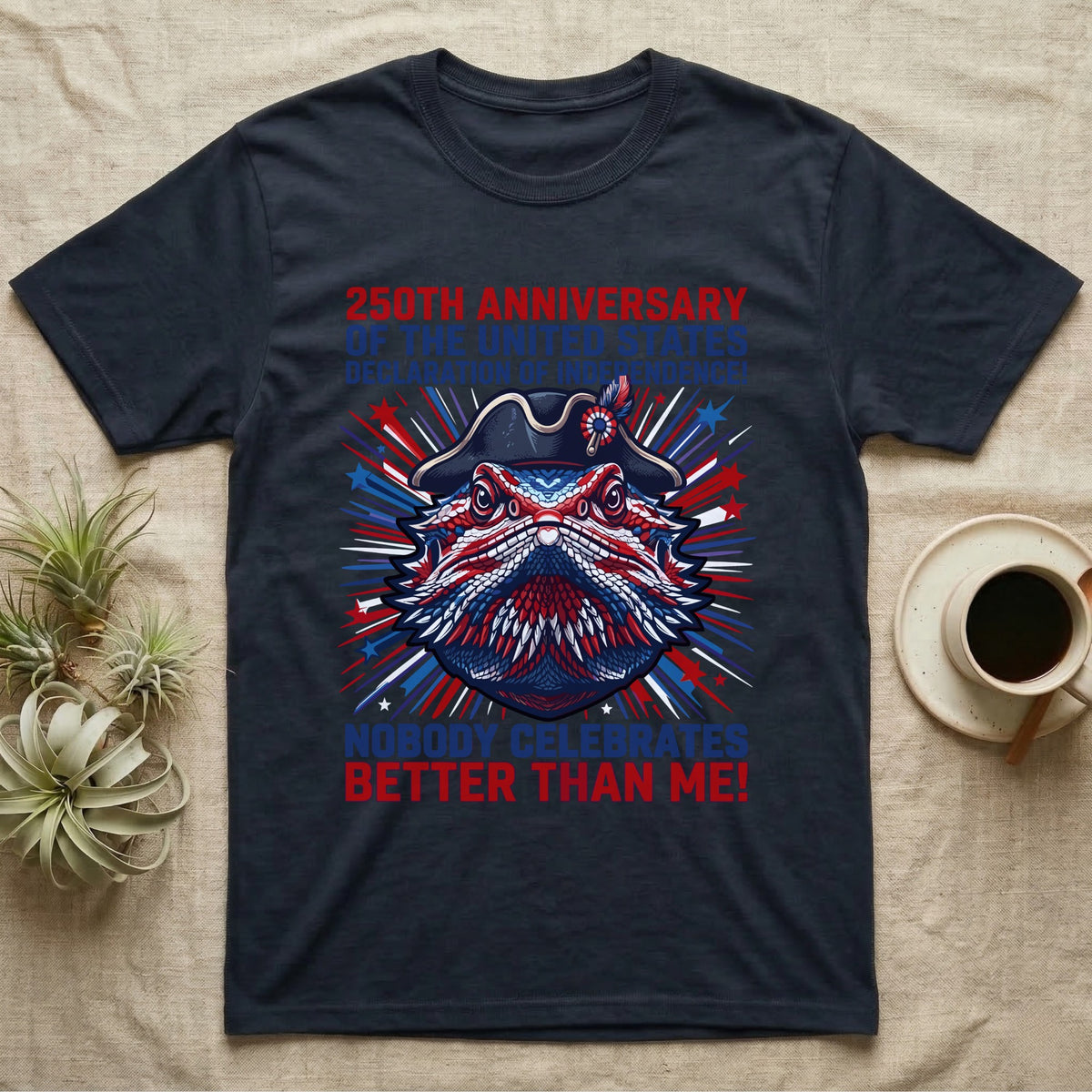Bearded Dragon Fireworks T-Shirt in Navy — Pop-art bearded dragon head in a tricorn hat amid red-white-blue fireworks under Nobody Celebrates Better Than Me.
