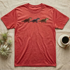 Crocodile Skink Morph Triptych T-Shirt in Heather Red — Three red-eyed crocodile skinks in a row, painted in thick impasto — bronze, near-black and pale olive forms.