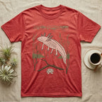 Axolotl Home Range T-Shirt in Heather Red — Woodcut-style illustration of an axolotl drifting among reeds and lily pads in a Xochimilco canal, no on-shirt text.