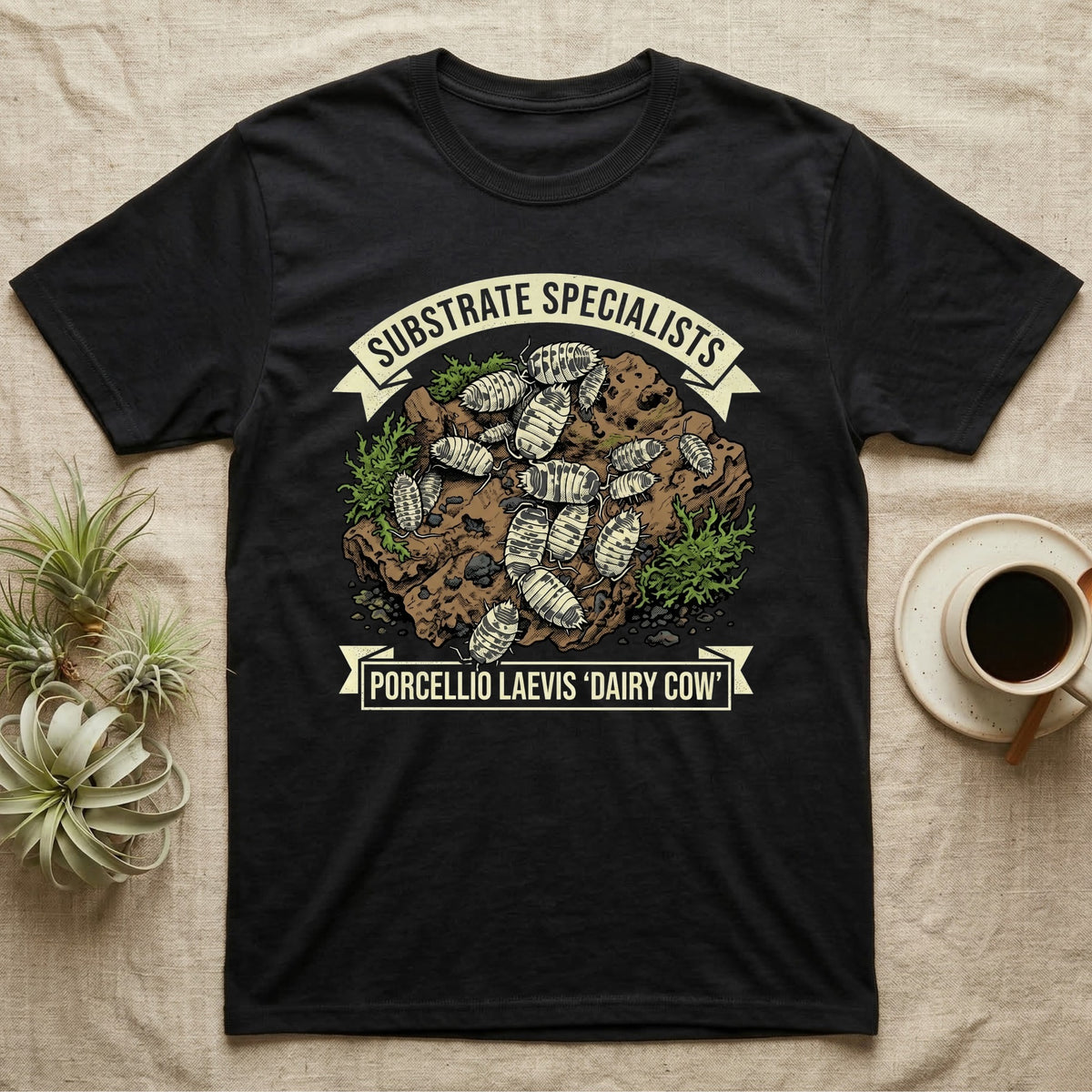 Dairy Cow Isopod Substrate Specialists T-Shirt in Black — Vintage print of a dairy cow isopod colony on a mossy soil clod between "Substrate Specialists" banners.