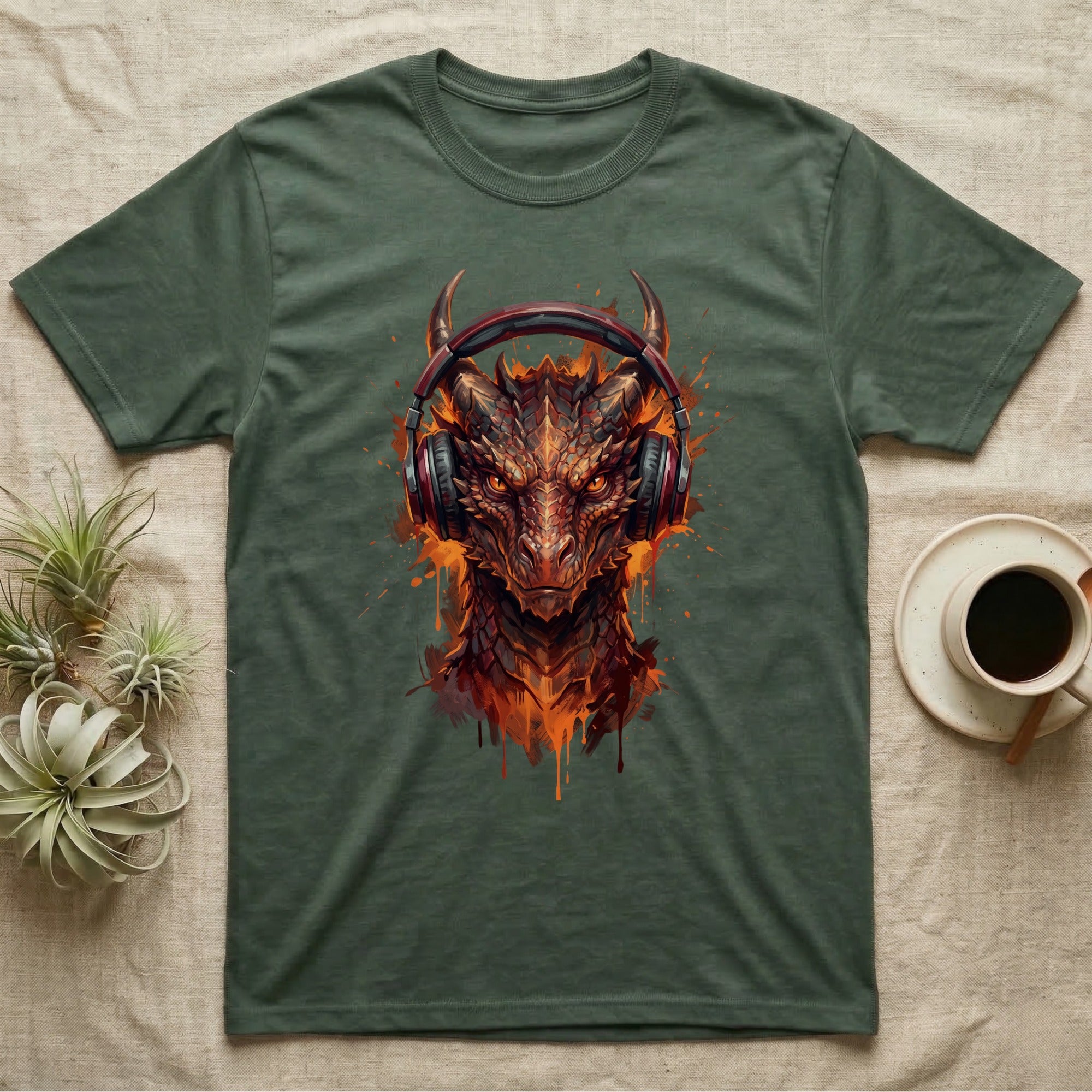 Green t-shirt with a fiery dragon head wearing headphones graphic.