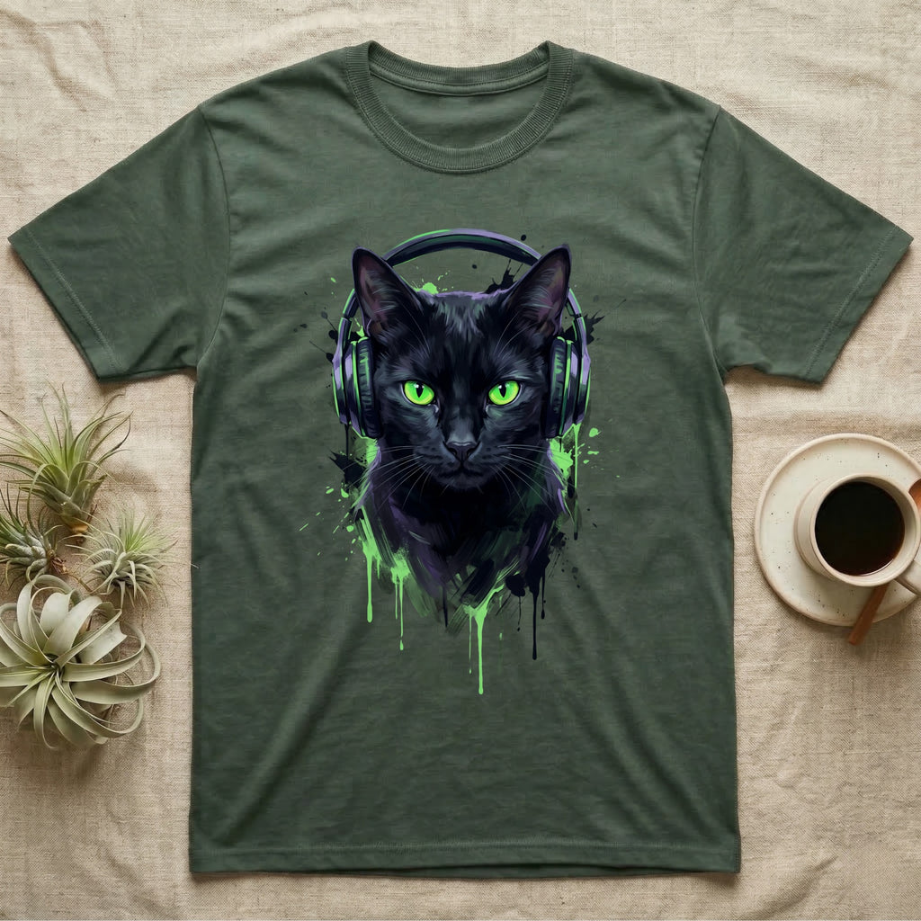 Black cat with bright green eyes wearing headphones and splattered paint design.