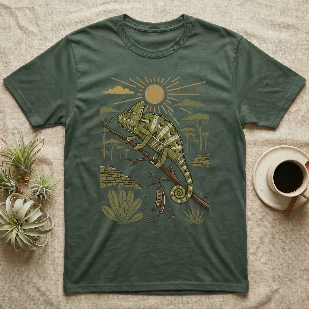Veiled Chameleon Home Range T-Shirt in Military Green — Woodcut-style illustration of a veiled chameleon gripping an acacia branch with terraced walls and umbrella trees behind, no on-shirt text.