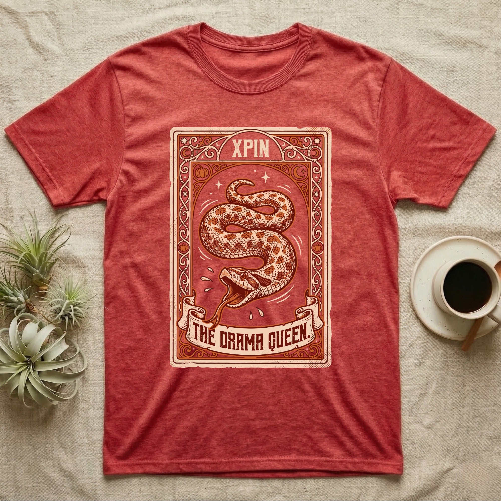 Hognose Snake Drama Queen T-Shirt in Heather Red — Ornate tarot card of a western hognose snake playing dead, banner reading "The Drama Queen."