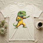 Anthropomorphic giant day gecko in a yellow-and-black martial-arts jumpsuit, low fighting stance, bold vintage-comic ink outlines and halftone shading, graphic-only design. — shown on a Natural tee.