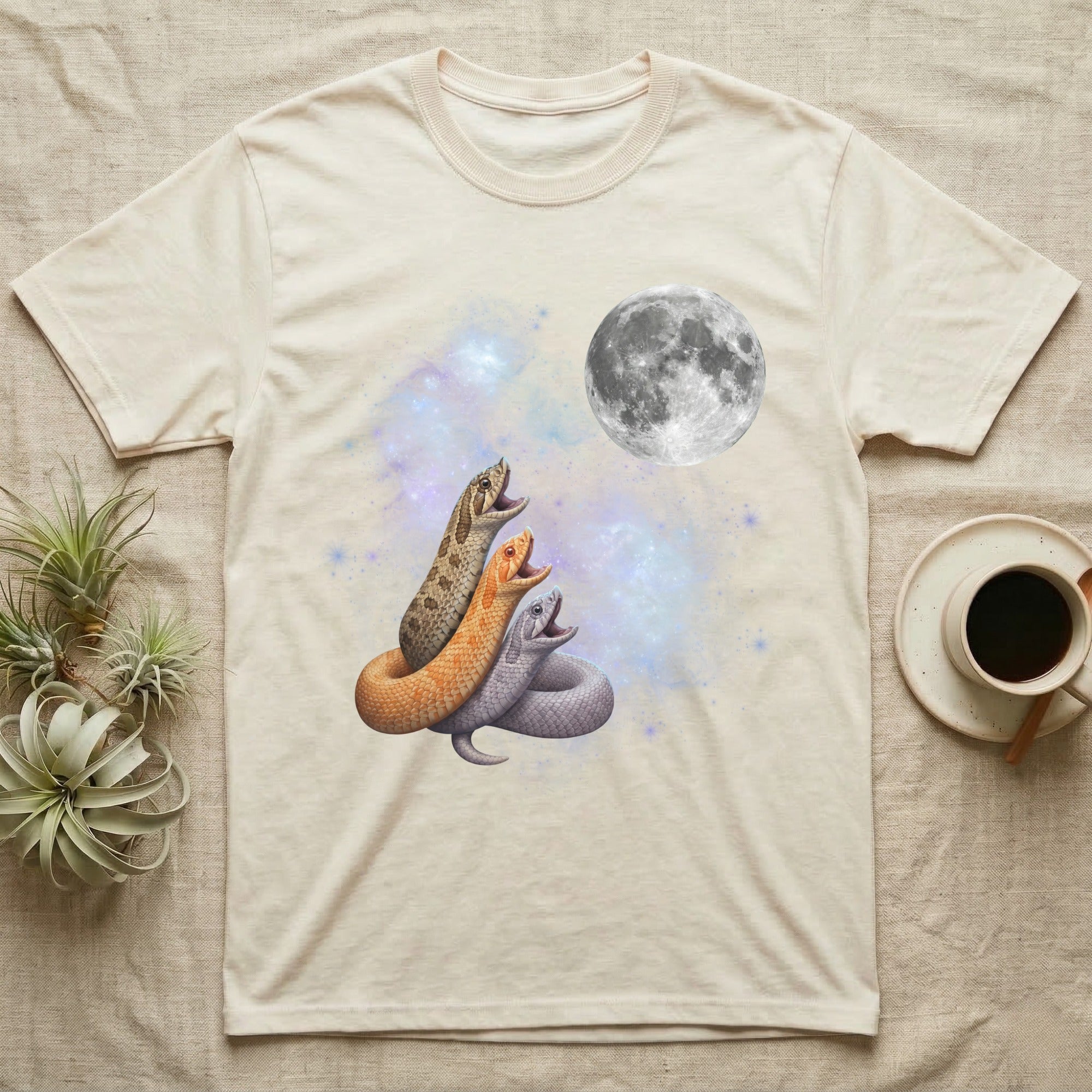 Western Hognose Snake Moon Howl T-Shirt in Natural — Three Western Hognose Snake colour morphs howling at a full moon over a nebula on a dark grey t-shirt.