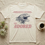 Tokay Gecko Permanently Offended T-Shirt in Natural — Engraved tokay gecko head with mouth open, Permanently Offended above and Adored in large type below.