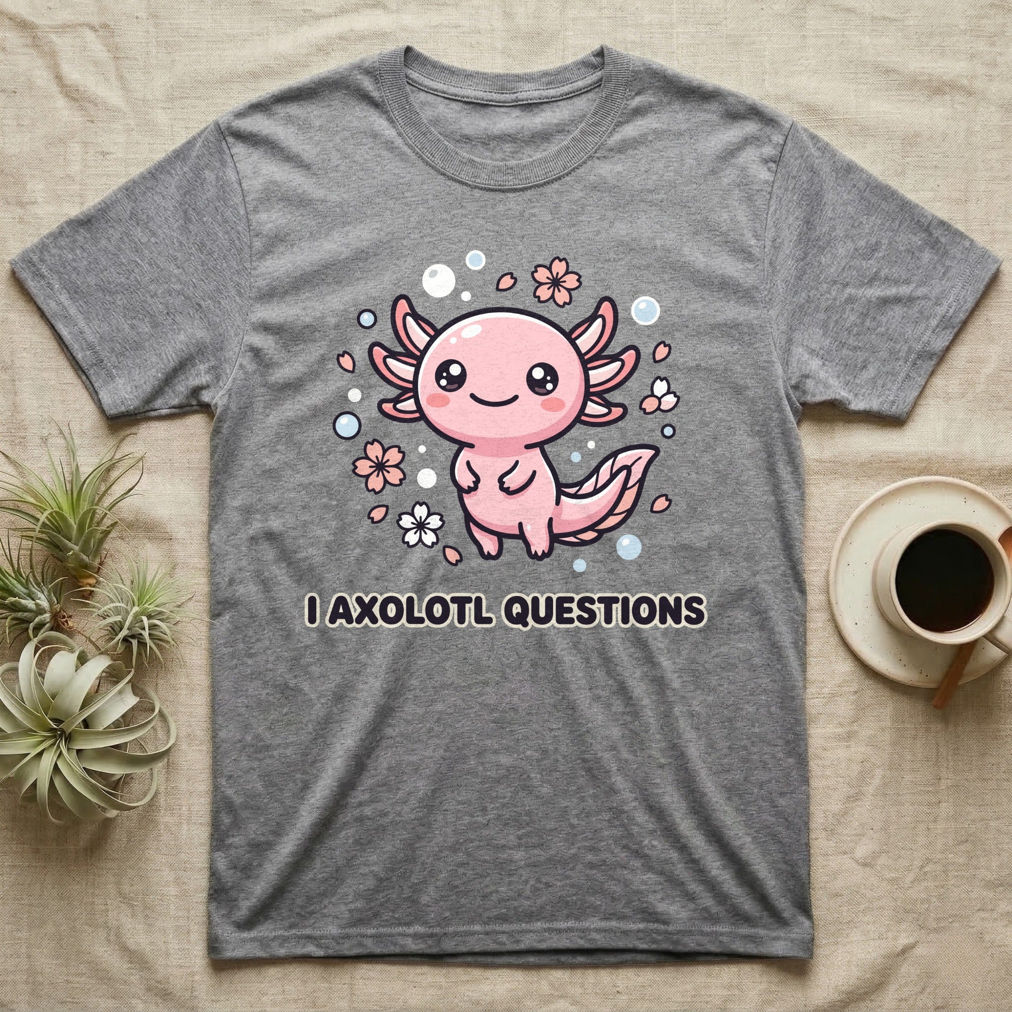Grey t-shirt with a smiling axolotl illustration and "I AXOLOTL QUESTIONS" text.