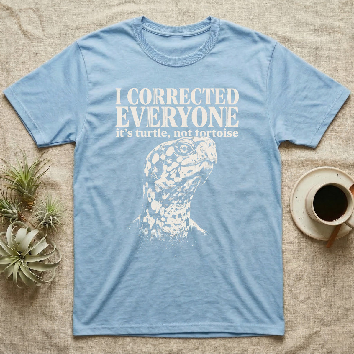 Box Turtle I Was Marinating T-Shirt in Light Blue — One-ink white eastern box turtle portrait on black, blotched head and neck, under the words I WAS MARINATING and it's called a soak.