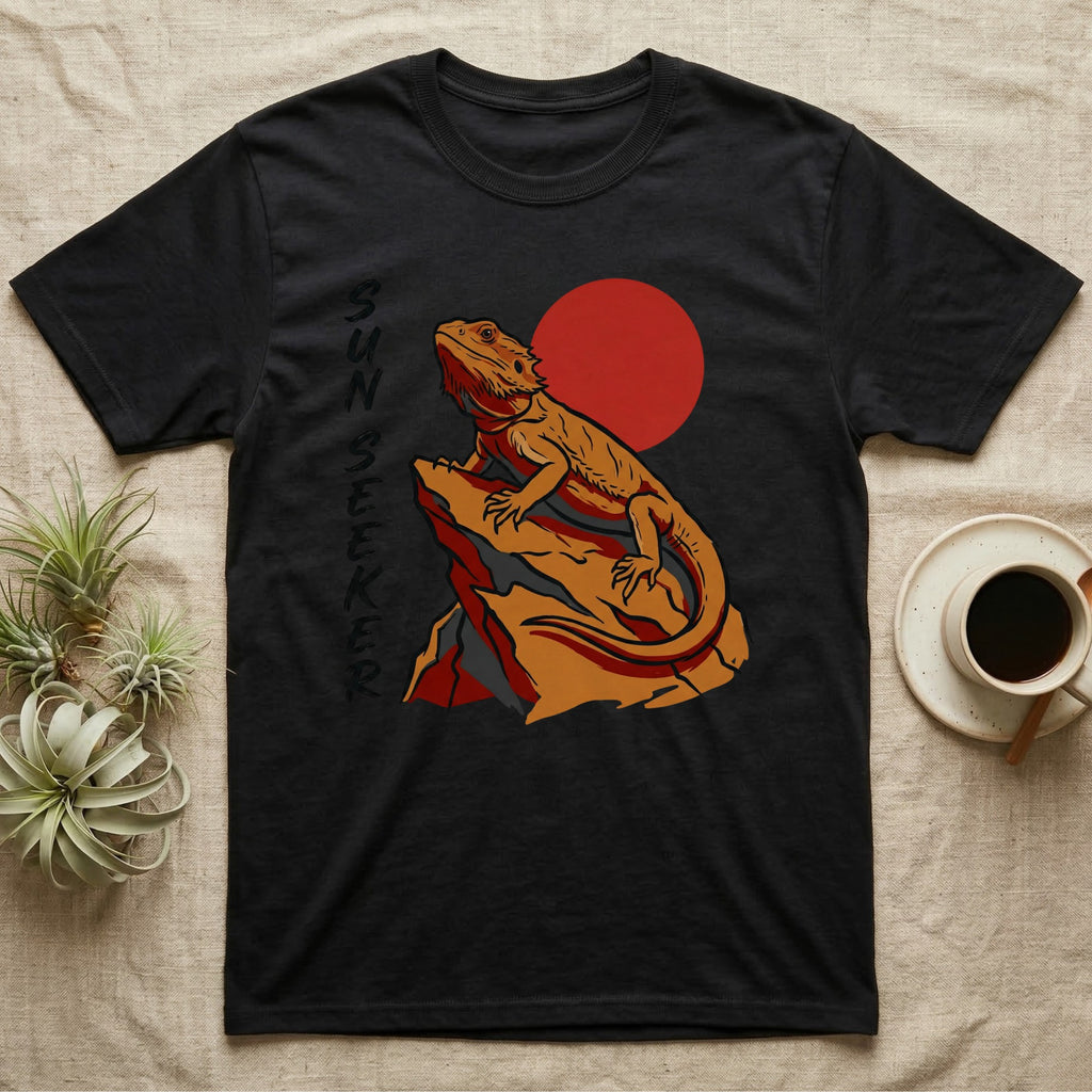 Black t-shirt with a bearded dragon on a rock with a red sun.
