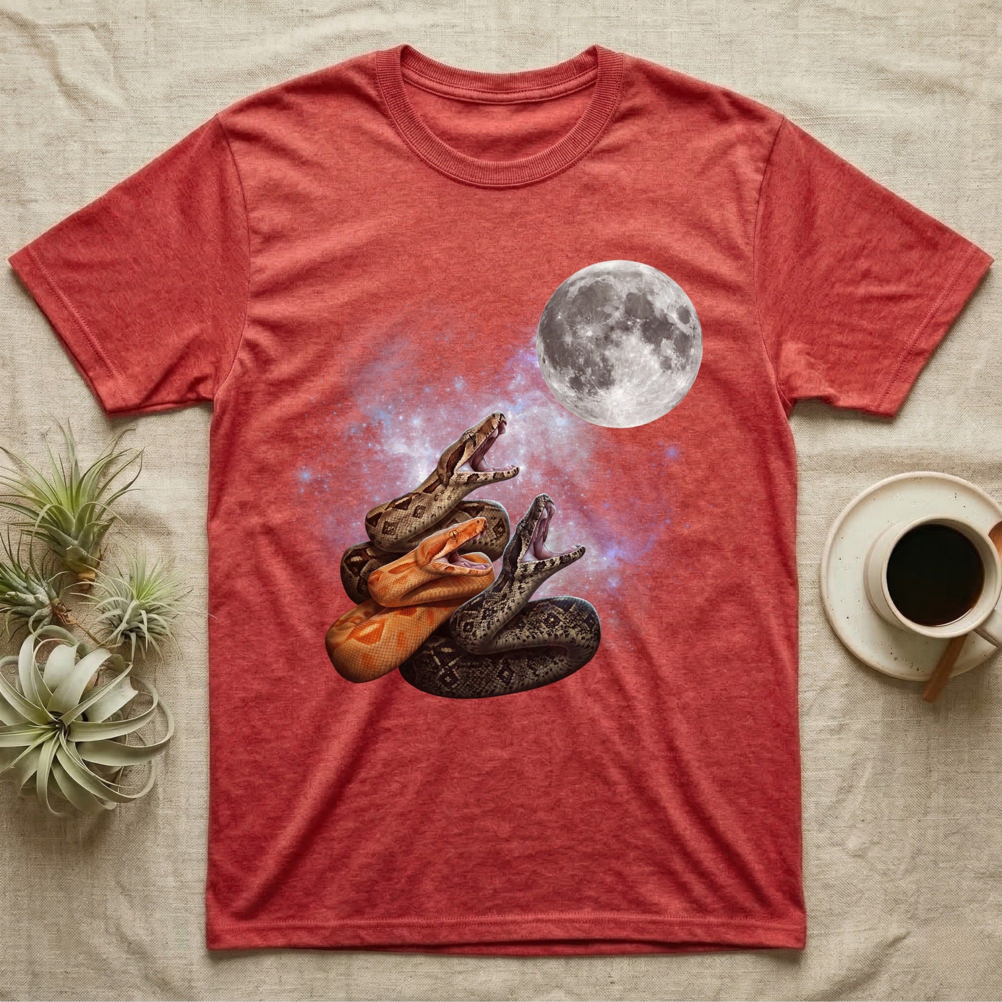 Boa Constrictor Moon Howl T-Shirt in Heather Red — Three Boa Constrictor colour morphs howling at a full moon over a nebula on a dark grey t-shirt.