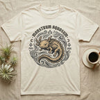 Cream t-shirt with "Monstrum Aquosum" text and a decorative axolotl illustration.