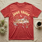 African Fat-Tailed Gecko Softie T-Shirt in Heather Red — African fat-tailed gecko with a plump tail under a puffy pastel "just thicc" bubble wordmark with tiny hearts.