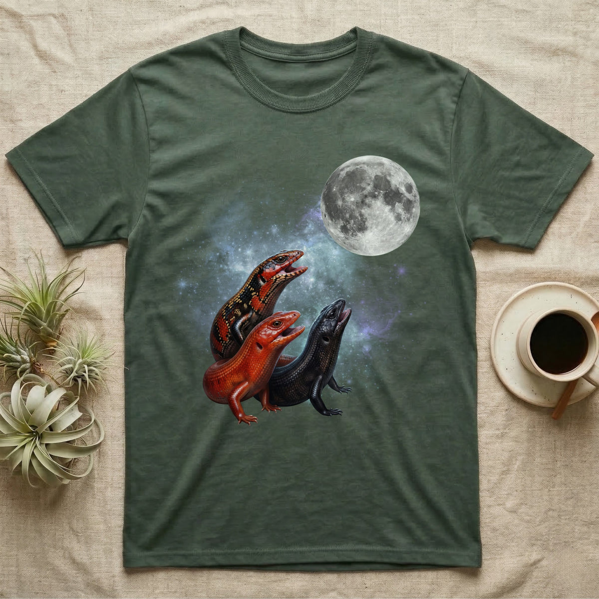 Fire Skink Moon Howl T-Shirt in Military Green — Three Fire Skink colour morphs howling at a full moon over a nebula on a dark grey t-shirt.