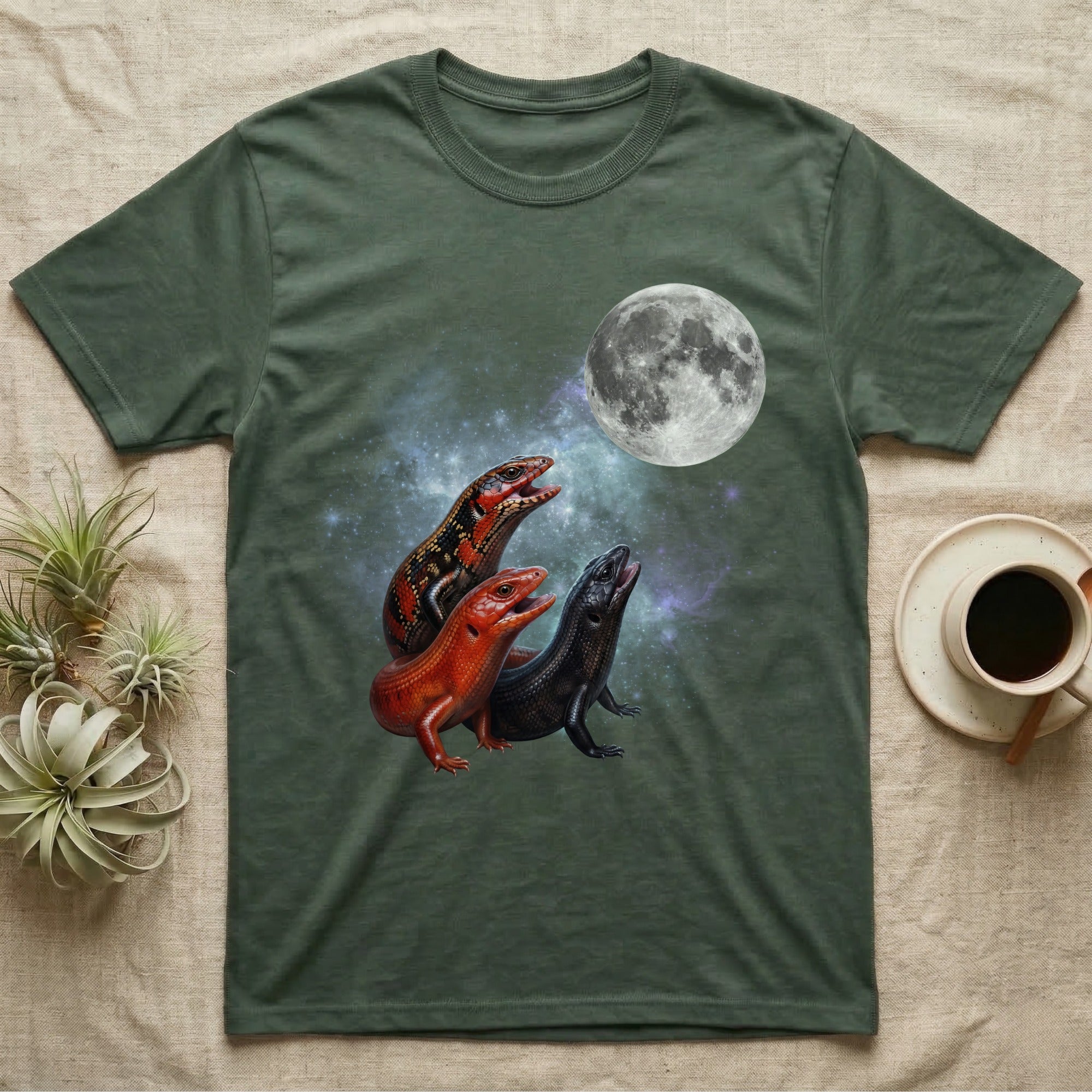 Fire Skink Moon Howl T-Shirt in Military Green — Three Fire Skink colour morphs howling at a full moon over a nebula on a dark grey t-shirt.