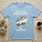 Bearded Dragon Low Poly T-Shirt in Light Blue — Low-poly faceted bearded dragon head in muted tones with text Liberty, Justice and Morning Crickets, 250 The Big One.