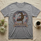 Leopard Gecko 1776 T-Shirt in Sport Grey — Vintage badge of a leopard gecko in an Uncle Sam hat with laurel wreath and flags, banner reading Strollin' For Reptiles Since 1776.