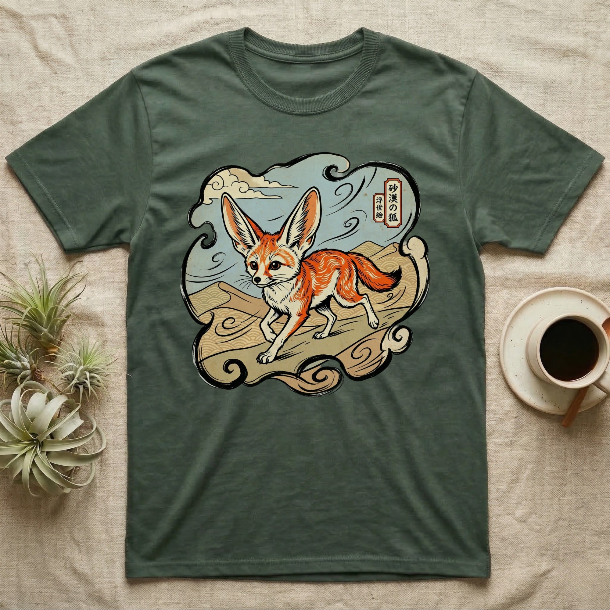 Green t-shirt featuring a fennec fox illustration with Japanese text above.