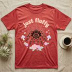 Mexican Redknee Tarantula Baby T-Shirt in Heather Red — Fuzzy Mexican redknee tarantula on a pastel web with blossoms under puffy peach bubble text "just fluffy".