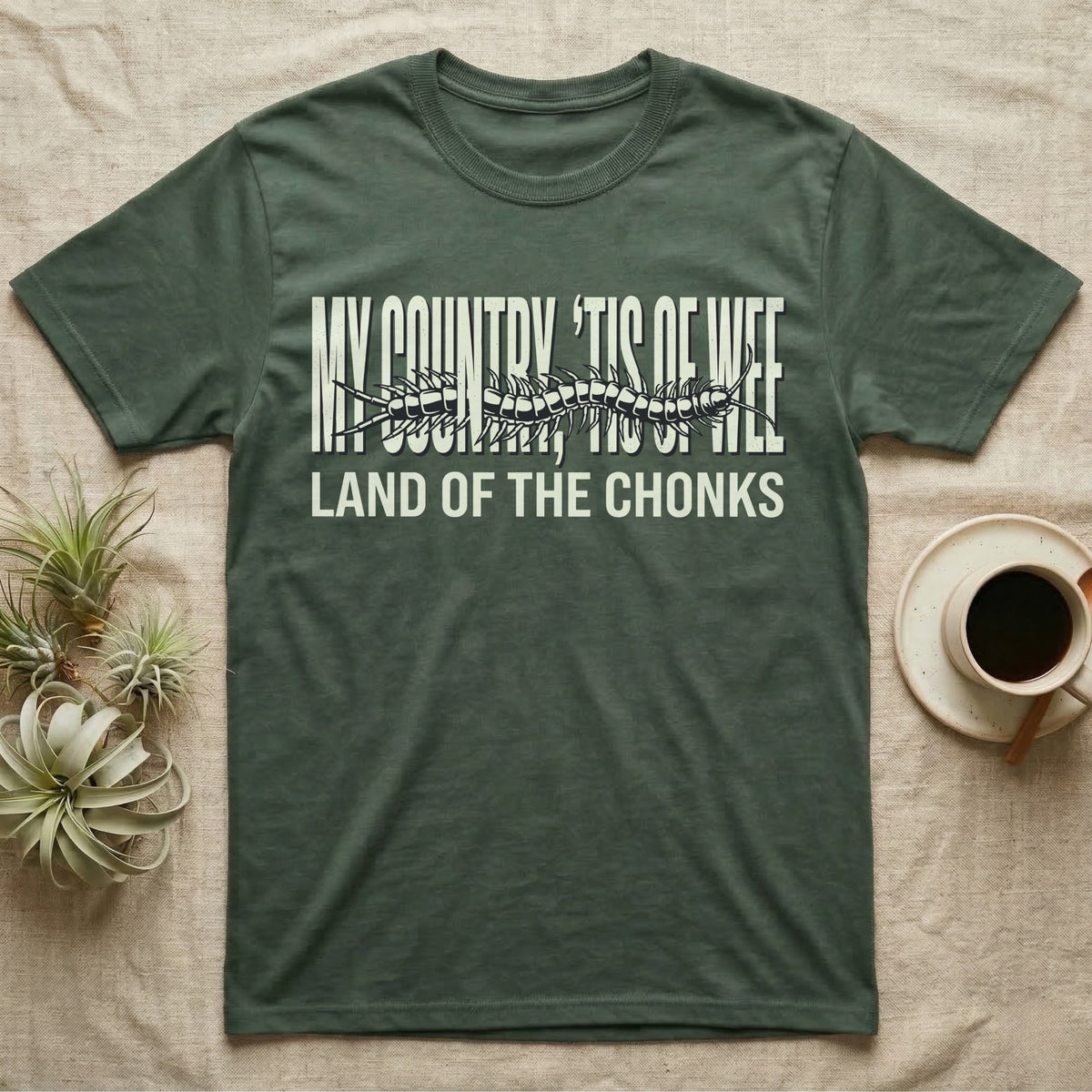Centipede Land Of Chonks T-Shirt in Military Green — Black-and-white woodcut centipede across distressed text reading My Country Tis of Wee, Land of the Chonks.