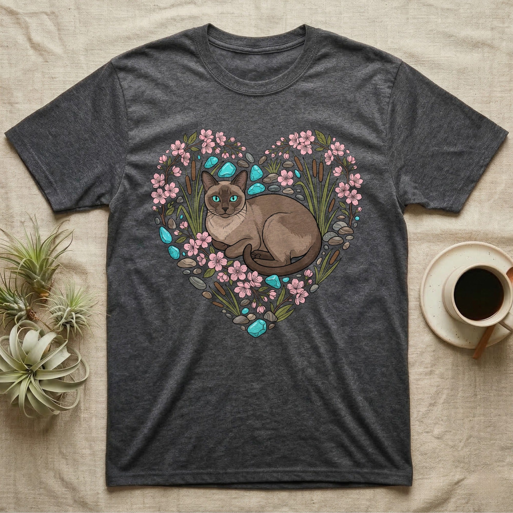 Dark grey t-shirt with a heart-shaped floral design featuring a Siamese cat.