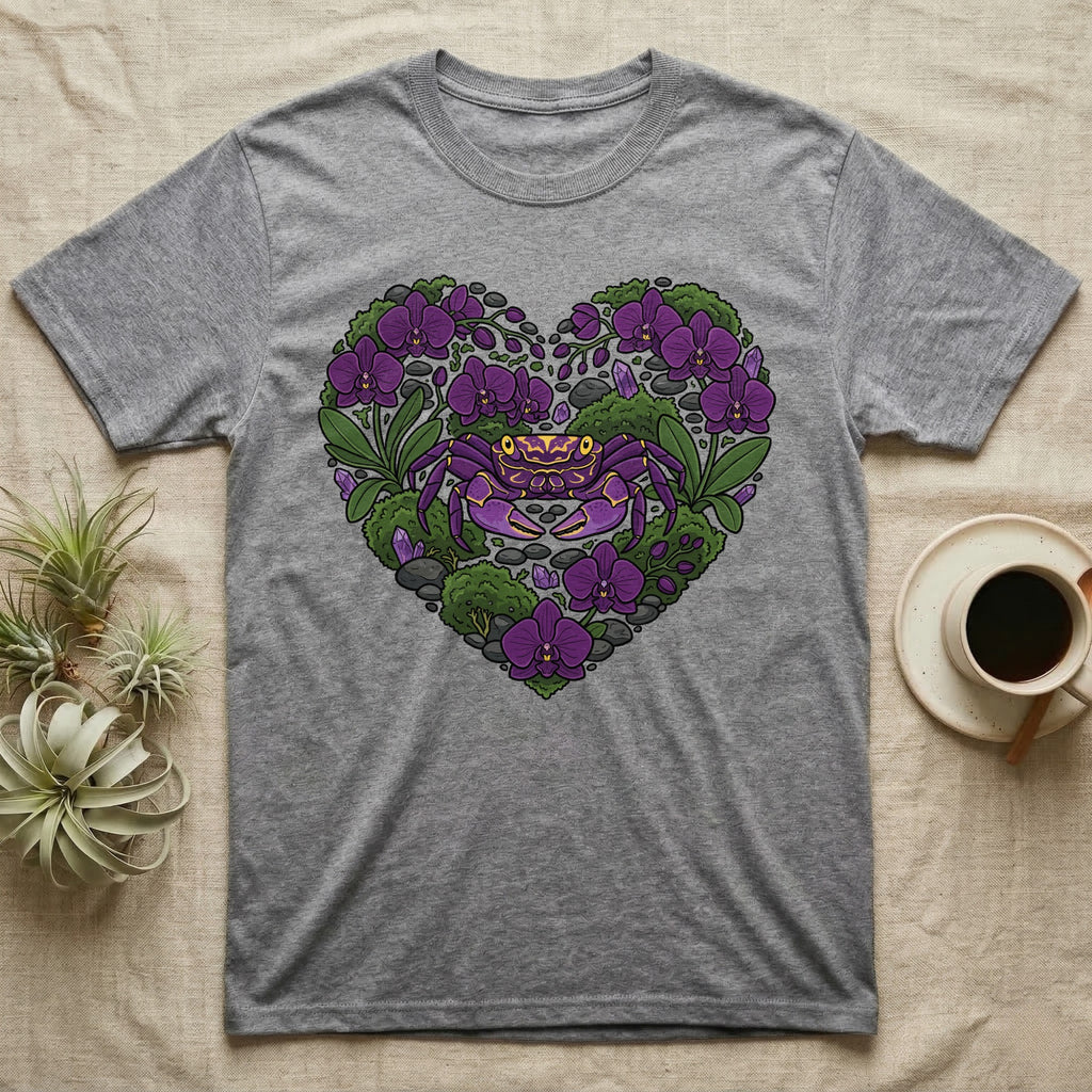 Grey t-shirt with a purple crab and purple orchids in a heart shape.