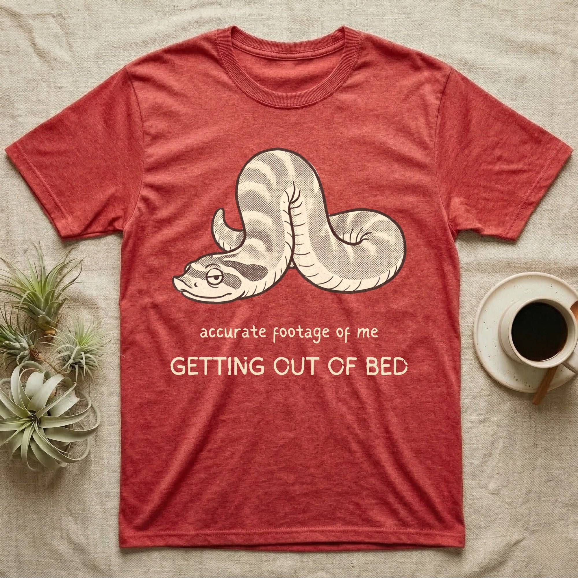 Hognose Morning Mood T-Shirt in Heather Red — Retro-illustration of a hognose snake flopped limp with hand-drawn marker text about getting out of bed.