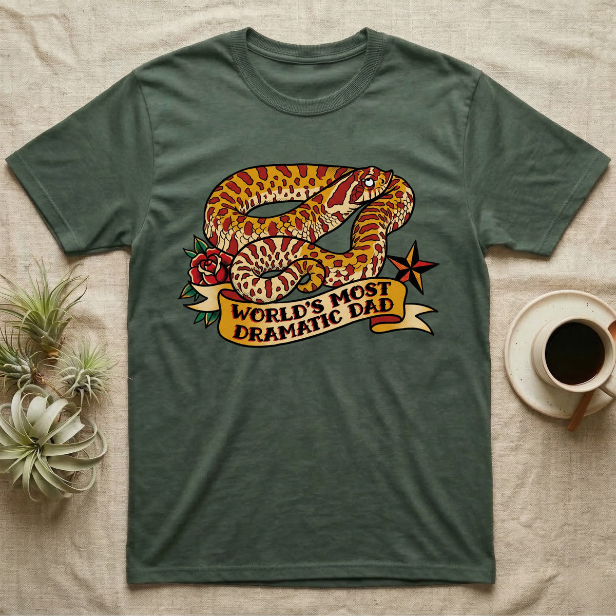Dramatic Dad Hognose T-Shirt in Military Green — Tattoo-flash illustration of a hognose snake mid-dramatic-flop with a banner reading World's Most Dramatic Dad.