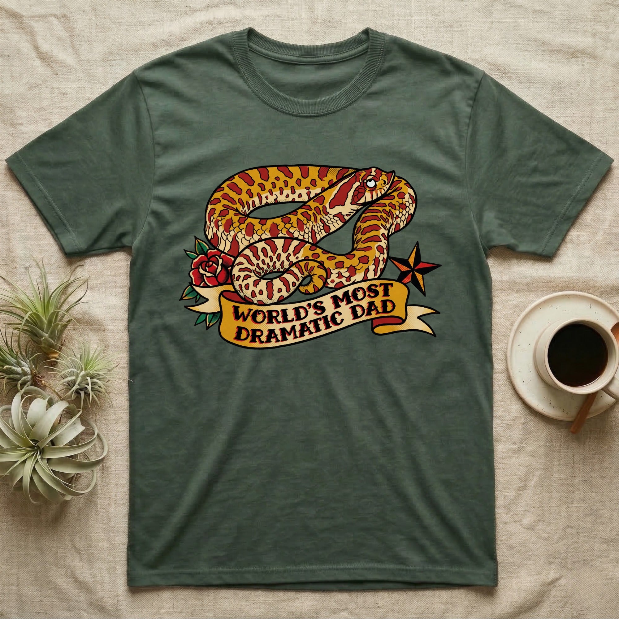 Dramatic Dad Hognose T-Shirt in Military Green — Tattoo-flash illustration of a hognose snake mid-dramatic-flop with a banner reading World's Most Dramatic Dad.