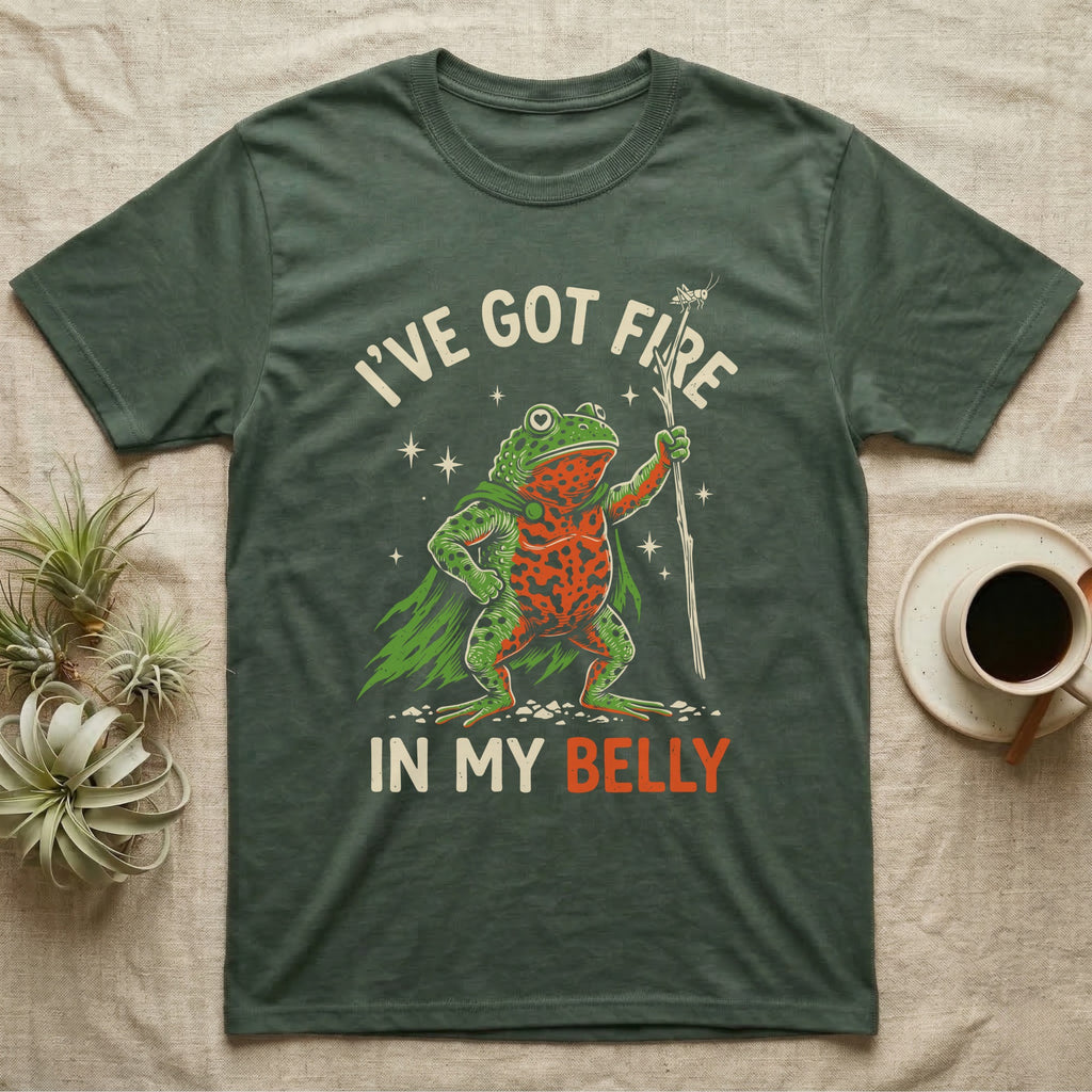 Fire-Bellied Toad Knight T-Shirt in Military Green — Fire-bellied toad knight with green cape, orange belly and a cricket on a twig spear, lettered I'VE GOT FIRE IN MY BELLY