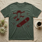 Knob-Tailed Gecko Kickflip T-Shirt in Military Green — Distressed one-ink illustration of a knob-tailed gecko airborne mid-kickflip above a tumbling skateboard.