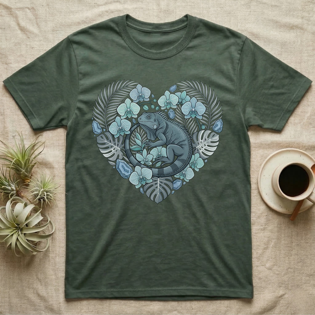Green t-shirt with a heart design featuring a lizard and tropical leaves.
