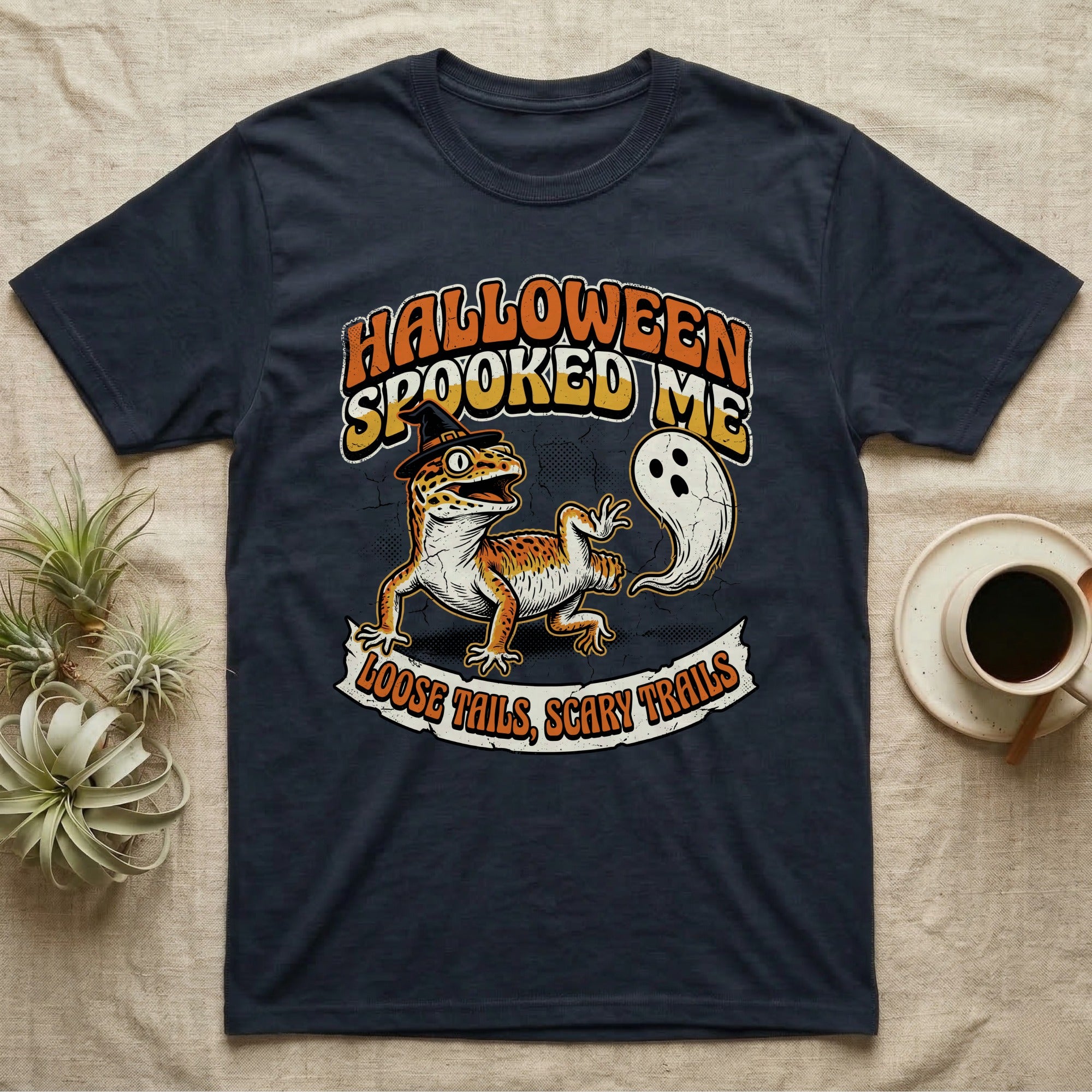 Leopard Gecko Spooked Me T-Shirt in Navy — Distressed graphic of a shocked leopard gecko in a witch hat beside its ghost-costumed dropped tail, "Halloween Spooked Me."