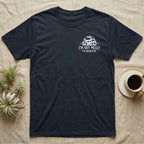 Bioactive Dairy Cow T-Shirt in Navy — White dairy cow isopod with black cow patches peeking over white marker capitals reading I'M NOT MESSY I'M BIOACTIVE.