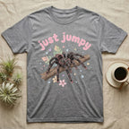 Pink Toe Tarantula Softie T-Shirt in Sport Grey — Pink toe tarantula poised to leap on a branch under a puffy pastel "just jumpy" bubble wordmark with tiny hearts.