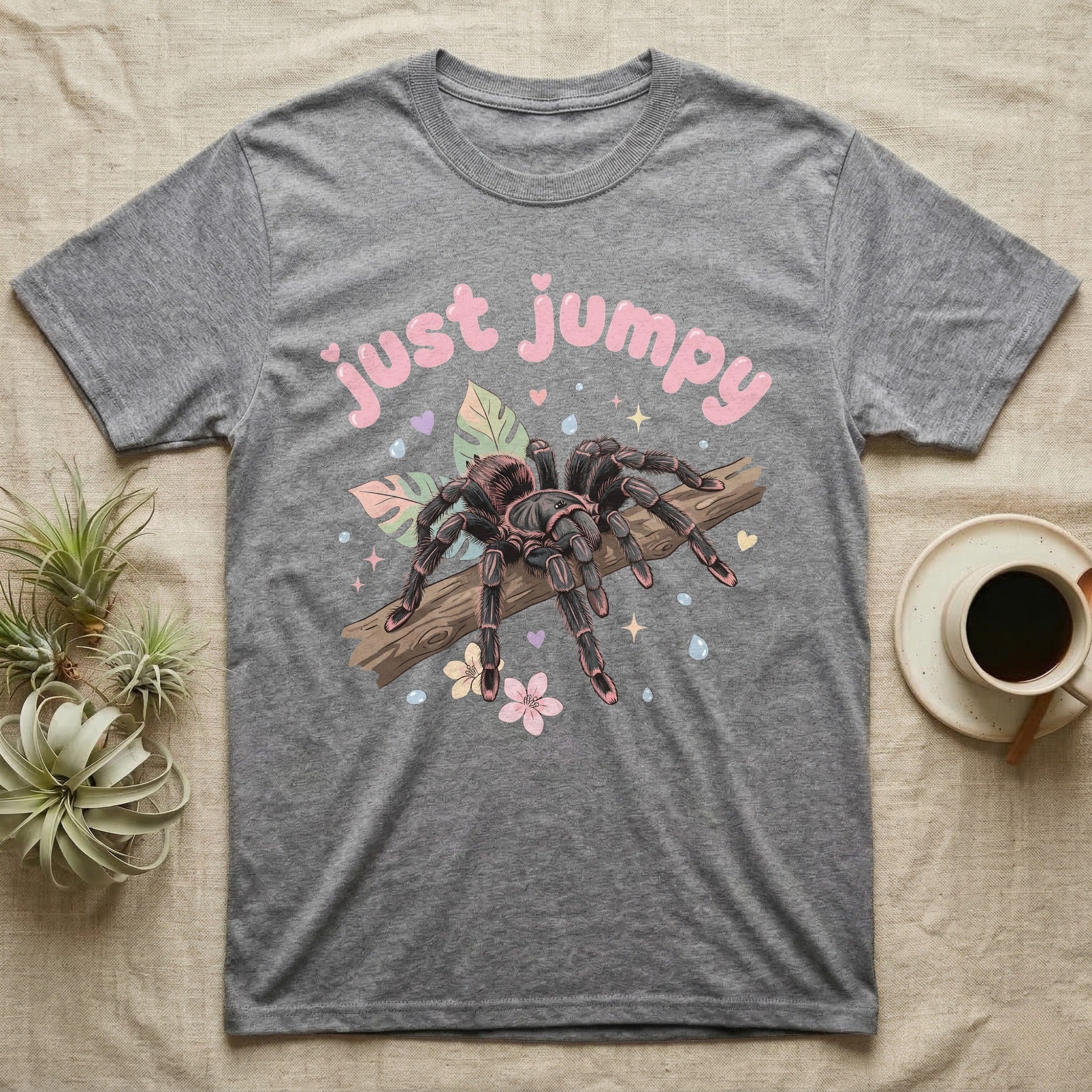 Pink Toe Tarantula Softie T-Shirt in Sport Grey — Pink toe tarantula poised to leap on a branch under a puffy pastel "just jumpy" bubble wordmark with tiny hearts.