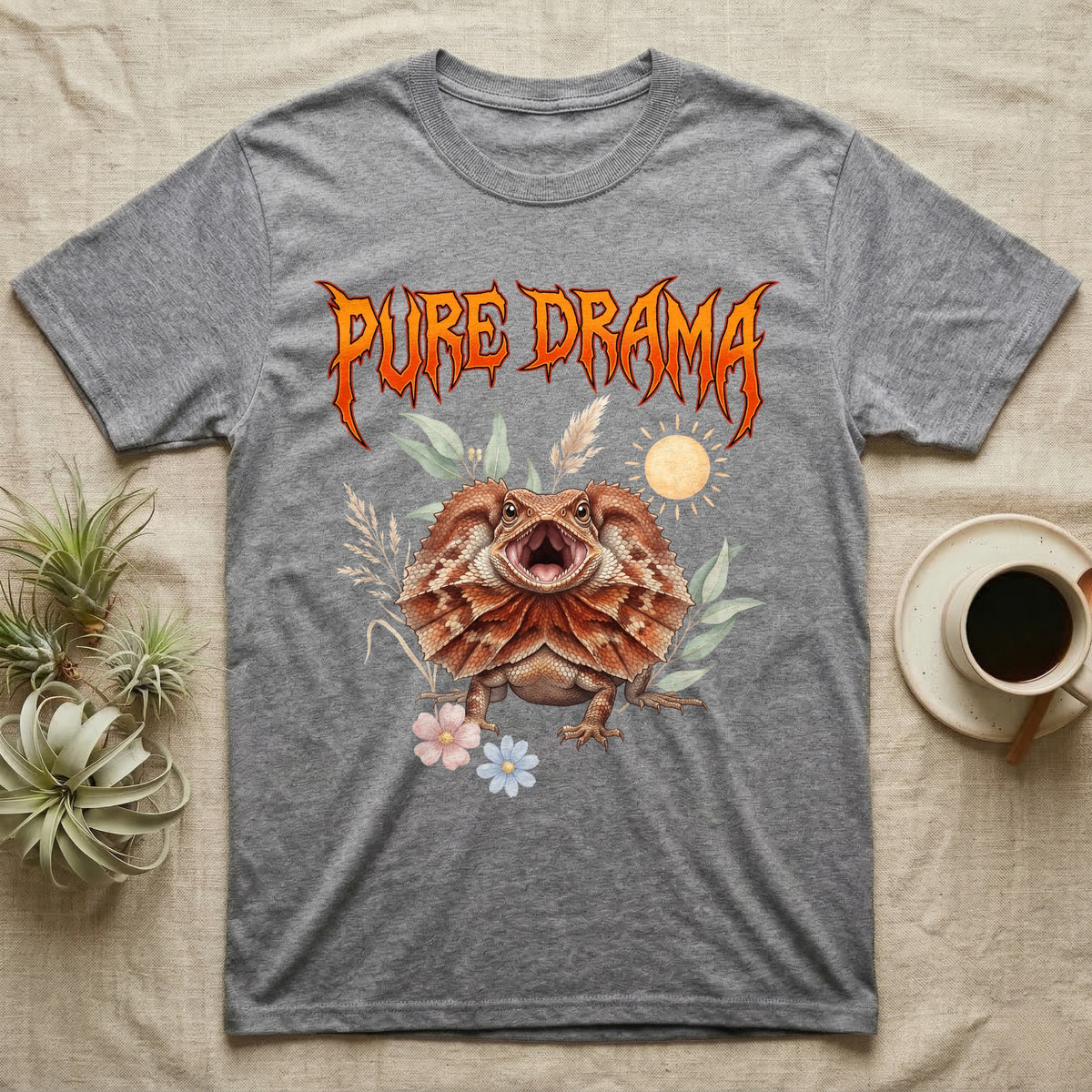 Frilled Dragon Feral T-Shirt in Sport Grey — Frilled dragon with its neck frill flared and mouth gaping under a jagged fiery-orange metal "PURE DRAMA" wordmark.